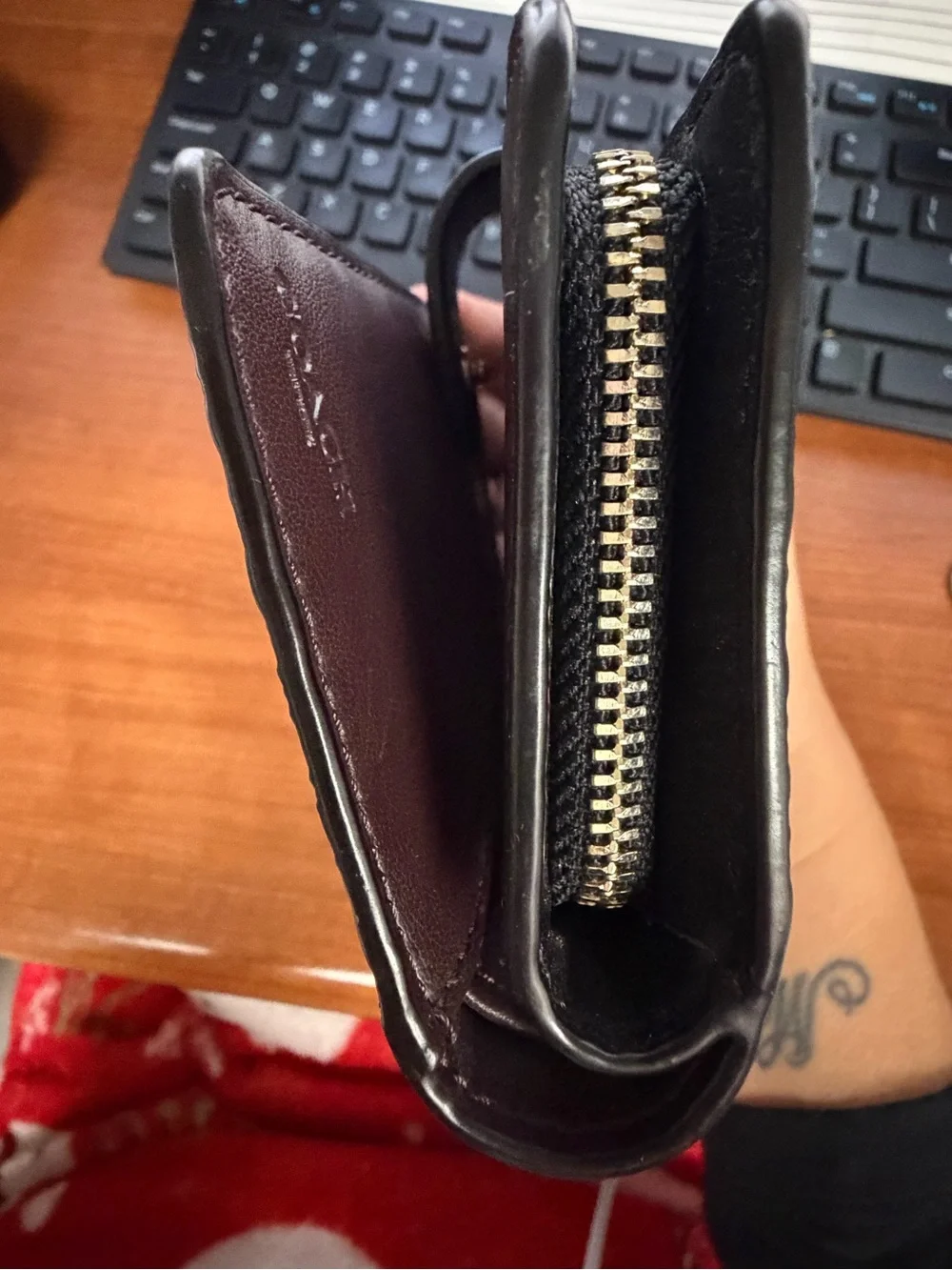 Coach Black Embossed Signature Leather Wallet with Gold Logo